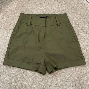 Express green midi high rise shorts